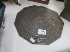 A early 19th century brass sundial plaque marked De Paris