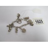 A silver charm bracelet,