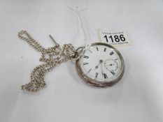 A silver pocket watch HM Birmingham 1908-09 and a silver double Albert chain marked 925