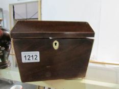 A lead lined mahogany tea caddy