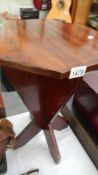 A mahogany occasional table