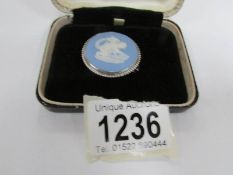 A Wedgwood cameo brooch set in silver in original box