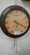 A vintage Smith's wall mounted timer clock in bakelite case