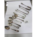 3 silver sugar tongs and 6 silver teaspoons,