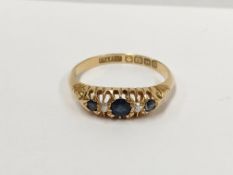 An 18ct gold diamond and sapphire ring,