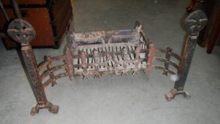 A cast fire grate with back plate a/f