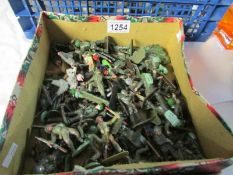 A quantity of toy soldiers including Britains