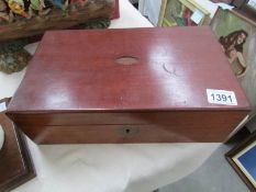 A mahogany games box and contents