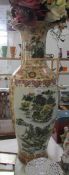 A large oriental vase with stand