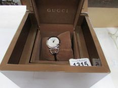 A boxed Gucci wrist watch,