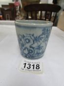 A 19th century blue and white pot with cockerel depictions