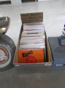 A box of 45 rpm EP reocrds including Tamla Motown, soul,