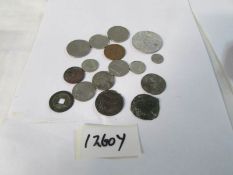 A small quantity of early foreign coins including 1905 calendar coin