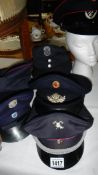 7 German fire service caps - 2 Munich, 1 Stuttgart, 1 Hamburg, 1 Neumunster,