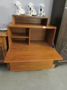 A teak drinks cabinet