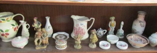 A shelf of assorted china