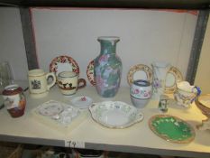 A shelf of good assorted china items including vases, tankards etc.