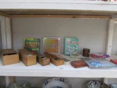 A shelf of vintage games including dominoes