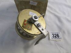 A vintage Belaco fishing reel in original box