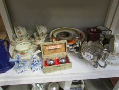 A shelf of miscellaneous china etc