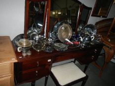 A mahogany dressing table and stool