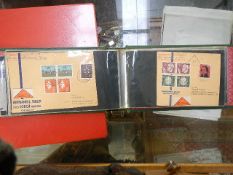 2 albums of German stamps and an album of stamped envelopes
