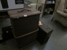 2 old cabin trunks