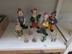 A mixed lot of clown figures
