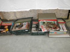 3 box folders of military model magazines and 2 box folders of military history magazines (military