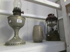 An oil lamp and a Tilley lamp