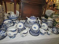 A mixed lot of blue and white willow pattern tea ware
