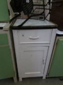 A vintage kitchen cabinet