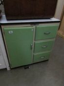 A vintage kitchen cabinet