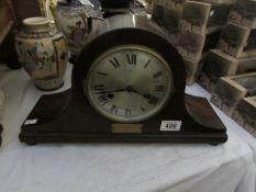 A mantel clock with presentation plaque for Lady Manners School 1950