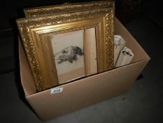 A box of picture frames etc