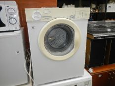 A white Knight tumble dryer