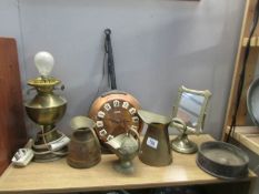 A quantity of brass ware including jugs, lamp etc.