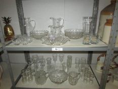 2 shelves of assorted glassware
