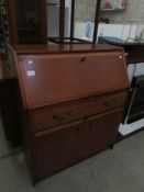 A teak bureau