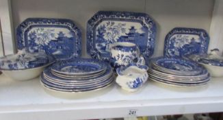 2 shelves of assorted pottery including Willow Pattern,