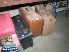 3 vintage suitcases