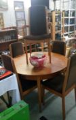A teak dining table & 5 chairs