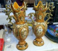 A pair of European majolica ewers A/F