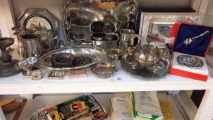 A large quantity of silver plate including tankards & candlesticks