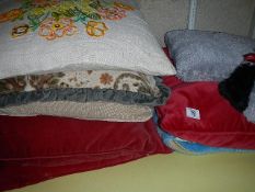 A quantity of cushions etc