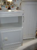 2 white bed side cabinets