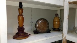 A clock & 2 wooden lamps