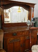 A mirror backed sideboard