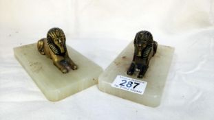 2 brass figures of ancient Egypt Sphinx on onyx base