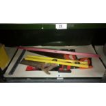 A quantity of tools including levels & saws etc,